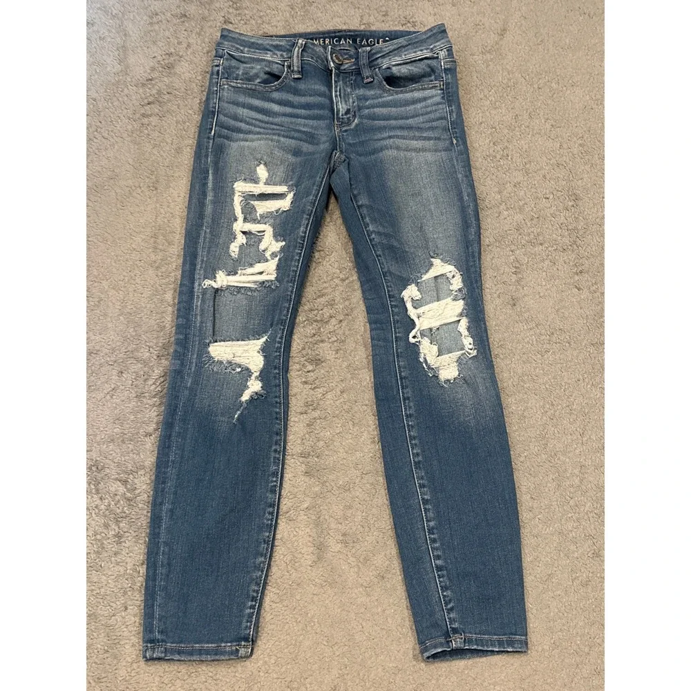 American Eagle Next Level Stretch Distressed Jeggings Blue Size 4 Short Skinny
